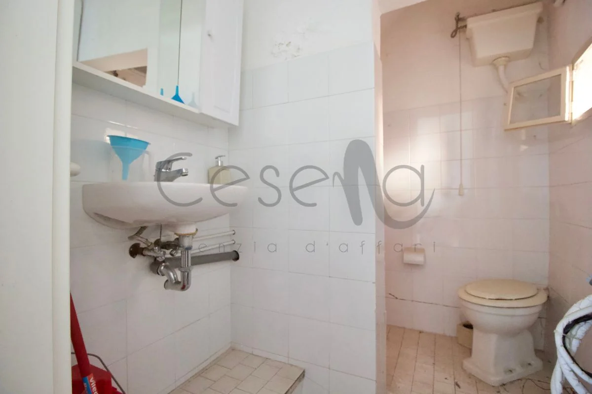 22 Rif 560 | Palazzina in centro storico composta da appartamento, negozio e garage